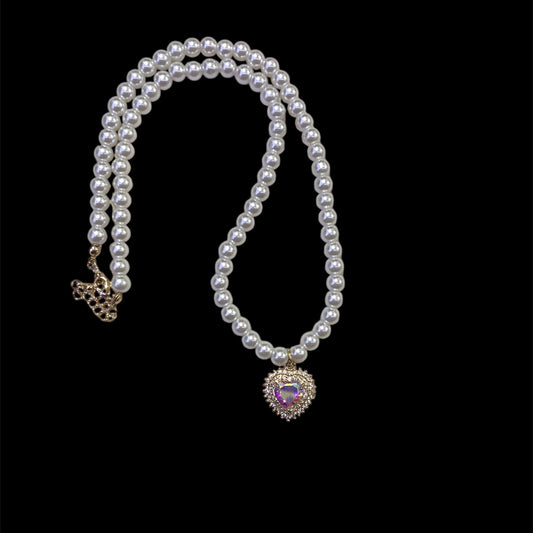 Collar de perlas con dije de corazon tornazol